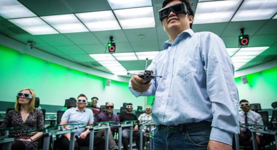 Group of people attending a THINKlab 3D presentation, University of Salford